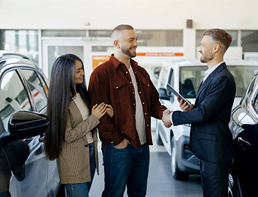 Car dealer handshake